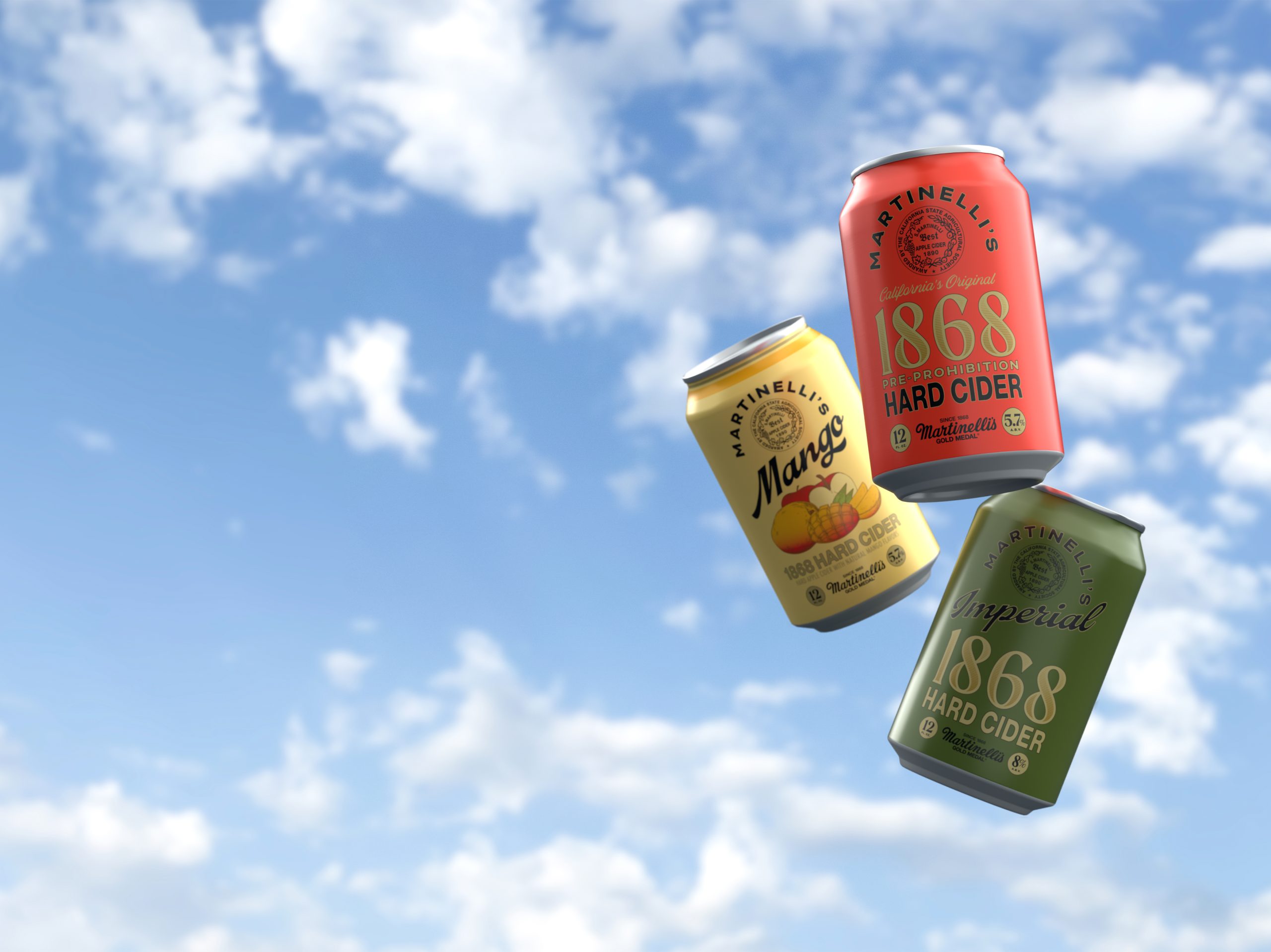 Three Martinelli's hard cider cans falling with a sky backdrop